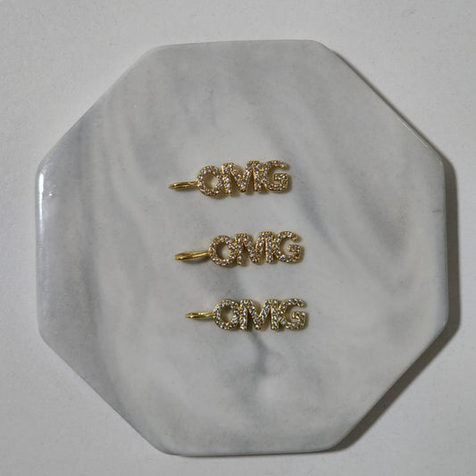 Dije OMG Baño Oro 18k & Zirconias